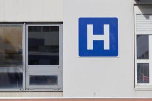 Blue hospital sign photo
