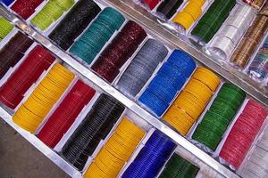 Multi-colored Glass Bangles for sale  can be used as a background texture wallpaper photo