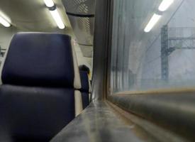 Dirty window. View in the suburban electric train. photo