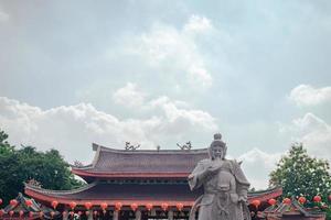 Traditional chinese guardian gate statute on the chinese temples when chinese new years. The photo is suitable to use for chinese new year, lunar new year background and content media.