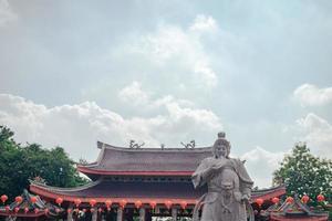 Traditional chinese guardian gate statute on the chinese temples when chinese new years. The photo is suitable to use for chinese new year, lunar new year background and content media.