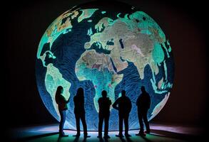 A group of people standing around a large globe with a map of the world. Generate Ai. photo