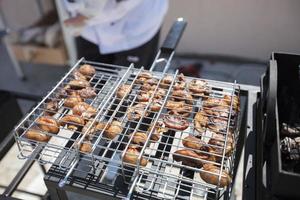 Fried mushrooms on a barbecue grill. photo