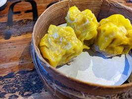 Close up photo dimsum or somay with chicken meat ball inside. The photo is suitable to use for food background, poster and food content.