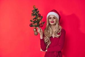 merry woman christmas holiday decoration fun red background photo