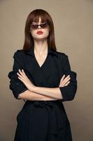 Stylish Woman Forbidden hands bright makeup dark glasses photo