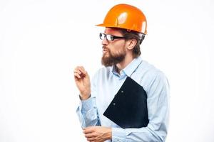 man in shirt orange helmet emotions work official photo