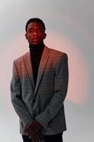 african looking man fashion jacket self confidence photo