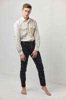 man in white shirts black pants and posing fashion lifestyle photo