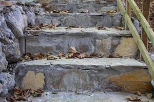 Stone stairs in the park, close-up of stone steps. photo