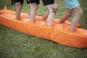 Sports game. Group competition. Orange Material. photo