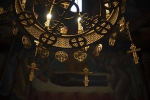 Chandelier in Church. Golden chandelier in temple. Interior of religious building. photo