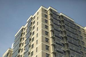 Windows in new building. Apartment building in city. New housing. photo