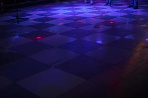 Music and color. Dance floor. Disco and floor lighting. photo