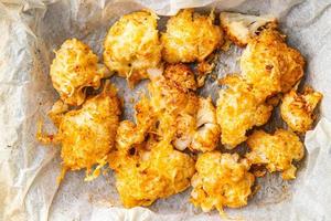 cauliflower with cheese baked vegetable meal food snack on the table copy space food background rustic top view photo