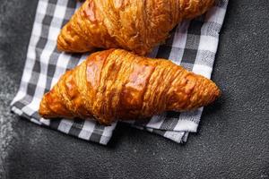 fresh croissant pastries meal food snack on the table copy space food background rustic top view photo