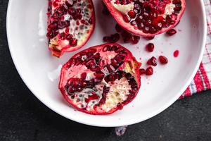 pomegranate fruit fresh food snack on the table copy space food background rustic top view photo