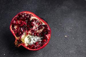 pomegranate fruit fresh food snack on the table copy space food background rustic top view photo