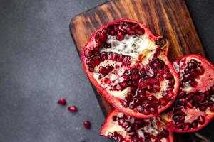 pomegranate fruit fresh food snack on the table copy space food background rustic top view photo