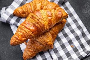 fresh croissant pastries meal food snack on the table copy space food background rustic top view photo