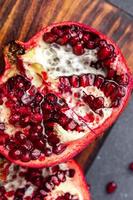 pomegranate fruit fresh food snack on the table copy space food background rustic top view photo