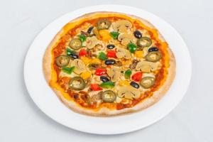 Hot fresh Chicken mushroom jalapeno pizza on white plate isolated white background. Homemade Pizza. Top views. photo