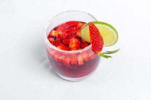 Classic frozen strawberry and lime margarita with fresh strawberries. Valentine's dessert recipe. Strawberry juice. photo