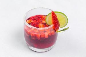 Classic frozen strawberry and lime margarita with fresh strawberries. Valentine's dessert recipe. Strawberry juice. photo