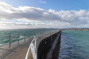 Jetty in the sea at Ogden Point Breakwater on Vancouver Island photo