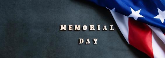 American flag on dark background. USA Memorial Day concept. Remember and honor. photo