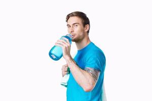 sports man blue t shirt water bottle thirst fitness photo