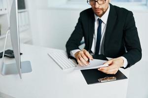 male manager an official is working at the computer Lifestyle photo