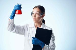 female laboratory assistant medicine diagnostics research biotechnology science photo