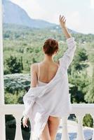 slender woman Sexy carefree model posing at the balcony Lifestyle photo