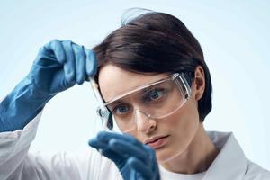 female scientist in white coat research laboratory Professional photo