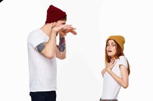 cheerful young couple white t-shirts in fashionable clothes modern style photo