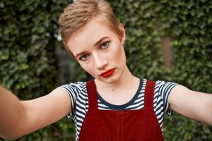 woman with short hair outdoors close-up leisure photo