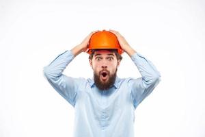 engineer in orange safety helmet in construction emotions professional lifestyle photo