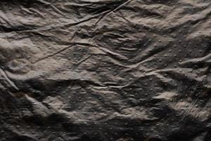 Black plastic bag texture background photo