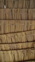 Close up of dried palm leave roof or nipa palm or thatch ceiling texture traditional Asian handmade. photo