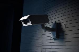 Camera surveillance on wall. Generate Ai photo