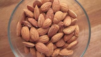 a bowl of almond nut close up video