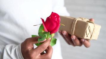 view of gift box and rose flower video