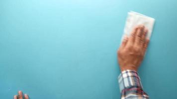 close up of person hand cleaning sofa with a cloth video