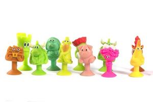 Bonstiki. A group of small rubber toys on a white background. photo