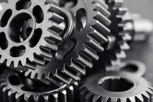 Gear and cogs wheels, clock mechanism, brass metal engine industrial. photo