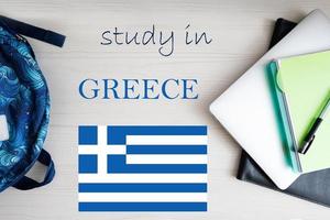 Study in Greece. Background with notepad, laptop and backpack. Education concept. photo