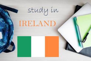 Study in Ireland. Background with notepad, laptop and backpack. Education concept. photo