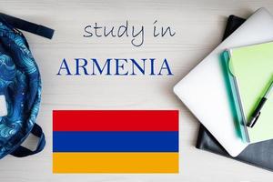 Study in Armenia. Background with notepad, laptop and backpack. Education concept. photo