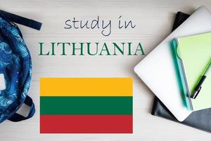 Study in Lithuania. Background with notepad, laptop and backpack. Education concept. photo